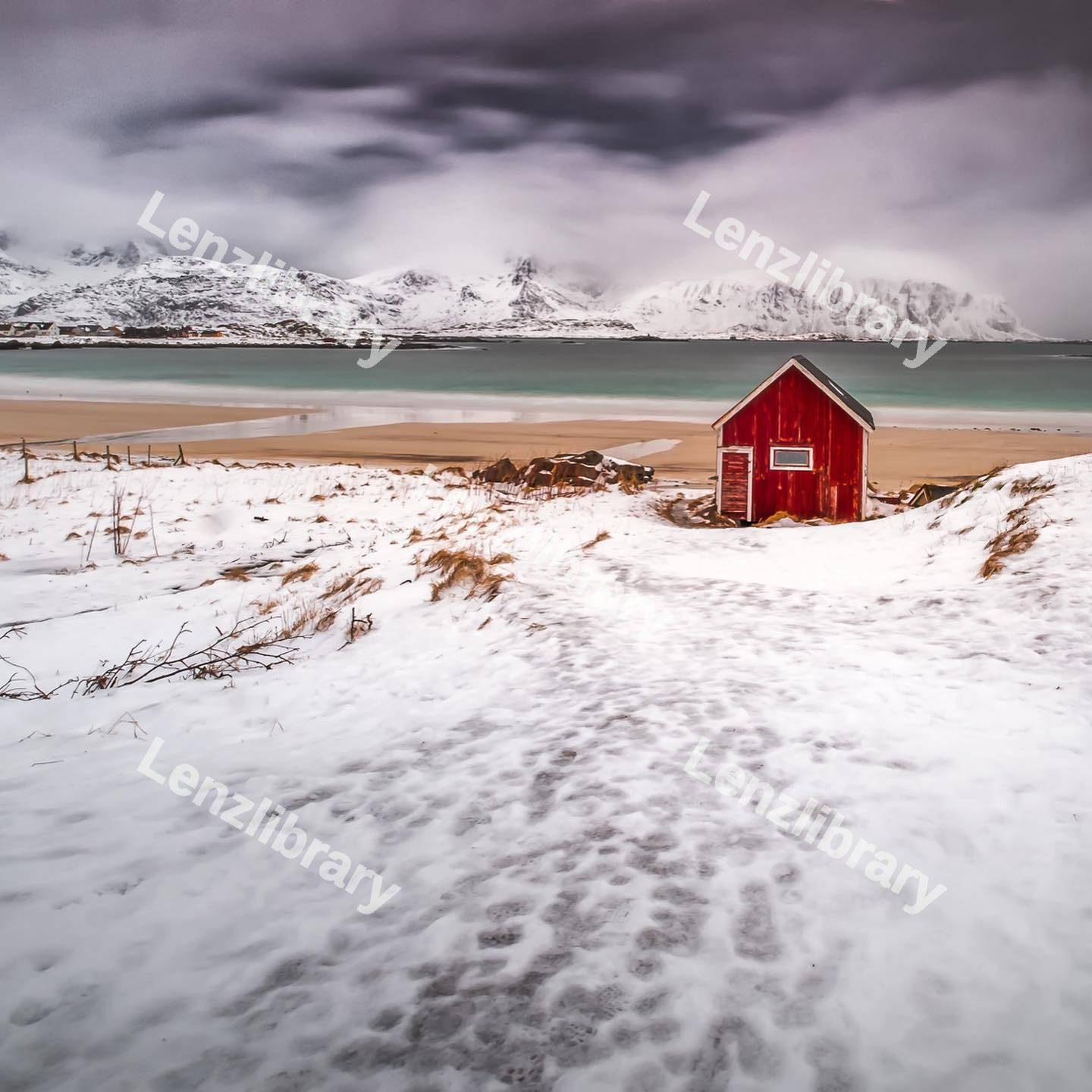 Red cabin with snow